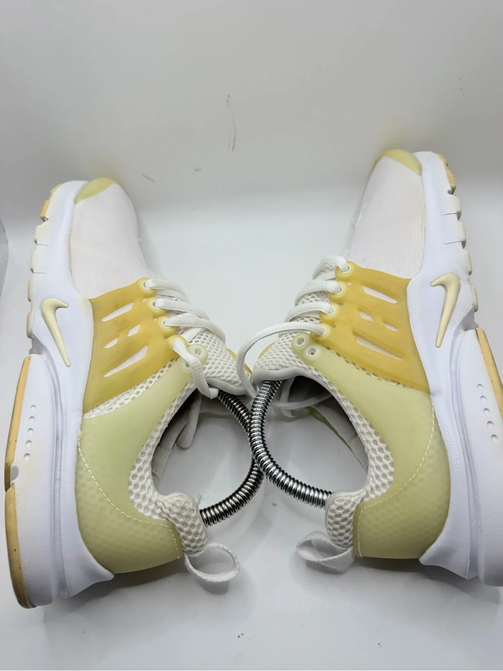 Nike Women's Pale Yellow and White Slip-On Athletic Sneakers